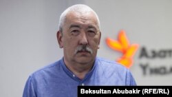 Исхак Масалиев.