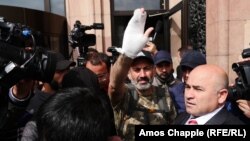 ARMENIA - Opposition leader Nikol Pashinian emerges from the Marriott Hotel after a short meeting with Prime Minister Serzh Sarkisian, 23 April 2018.