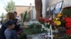 Armenia - Flowers are laid at a memorial in Yerevan to police officers killed during a July 2016 standoff with opposition gunmen, 17Jul2017.