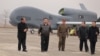 North Korean leader Kim Jong Un inspecting newly developed unmanned reconnaissance aircraft at an undisclosed location in North Korea. 