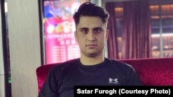 مشعل جمال‌زی محصل افغان در شهر ووهان چین 