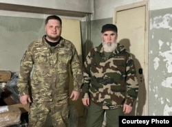 Пресс-секретарь БШМ Саид и комбат Муслим Чеберлоевский.