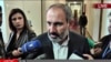 Opposition leader Nikol Pashinian talks to journalists in Yerevan on April 30.