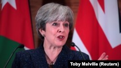 Тереза Мэй Иорданиянын борбору Аммандагы маалымат жыйынында, 30-ноябрь.