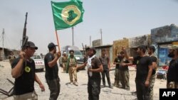 Өкмөт тарапта согушуп жаткан шиит кошуундары Баижиде. 8-июнь, 2015-жыл.