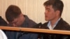 Подсудимые по делу полицейских, обвиняемых в причастности к стрельбе в Жанаозене. Актау, 27 апреля 2012 года.