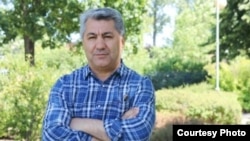 Тажикстанда тыюу салынган "Ислам кайра жаралуу партиясынын" бозгундагы лидери Мухиддин Кабири.