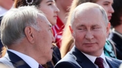 Президент России Владимир Путин и бывший президент Казахстана Нурсултан Назарбаев на торжествах по случаю Дня Москвы. 7 сентября 2019 года.