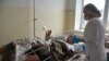 ARMENIA -- A wounded Armenian serviceman with heavy burns who claimed that Azerbaijani forces had used phosphorus munitions against him, undergoes treatment at a hospital in Yerevan, December 8, 2020