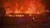 Firefighters put out the fire following a Russian attack in the Kyiv region, July 9, 2025.