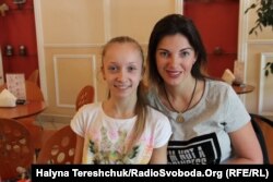 Христина Погранична з тренером Іриною Рудою