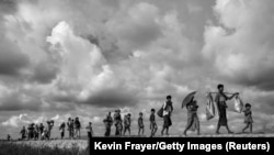 Мьянмалык качкындар Бангладештин аймагында.  World Press Photo-2018 сынагына сунушталган сүрөт.