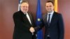 Macedonian Deputy Prime Minister Bujar Osmani (right) with Greek Foreign Minister Nikos Kotzias in Athens. 