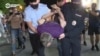 Police detain a protester following a scuffle during a rally in Khabarovsk on July 26. 