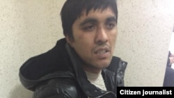 Хуснидин Зайнабидинов в отделении полиции.