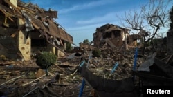 Ուկրաինա - Ռուսական հրթիռի ընկնելու հետևանքով վնասված շինություններ Կիևի շրջանում, 23-ը հունիսի, 2024թ.