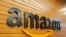 India - The logo of Amazon is pictured inside the company's office