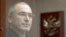 Михаил Ходорковский: за стеклом от правосудия. Фото 2010 года