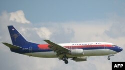 «Sriwijaya Air» аба жолдору компаниясынын башка учагы. 2013-жылдын 18-марты.