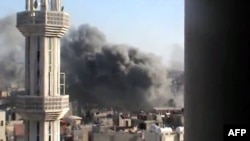 Լուսանկարն արված է սիրիական Հոմս քաղաքում հունիսի 6-ին: