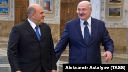 Міхаіл Мішусьцін і Аляксандар Лукашэнка ў Палацы незалежнасьці 