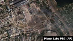 Наслідки удару ЗСУ по російських складах боєприпасів в окупованій Новій Каховці на Херсонщині 11 липня