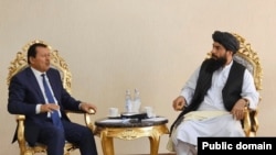 Саймуъмин Ятимов ва Юсуф Вафо, волӣ ё раиси вилояти Балхи Афғонистон 