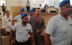 Віталія Марківа супроводжують у день вироку, 12 липня 2019 року, Павія