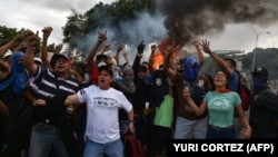 Оппозиционная демонстрация против власти Николаса Мадуро и чавистов. Каракас, 23 января