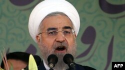 Իրանի նախագահ Հասան Ռոհանին ելույթ է ունենում Թեհրանում զորահանդեսի ժամանակ, 22-ը սեպտեմբերի, 2015թ․