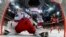 Canada's Ennis Tyler scores against Russia during the ice hockey world championship game in Prague on May 17. 