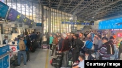 Үзбәкстанның эшче мөһаҗирләре. Архив фотосы
