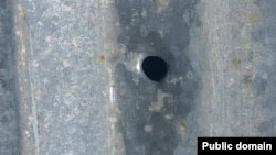 Armenia - A bullet hole on the roof of a house in the village of Khnatsakh, May 8, 2025.