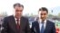 Тажик президент Эмомали Рахмон (ортодо), уулу Рустам (оңдо)