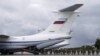 Russian paratroopers board an Ilyushin Il-76 transport plane as they take part in joint military exercises in Russia's Kaliningrad region in September.