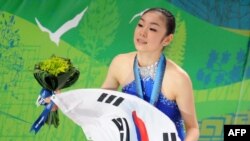 Олимпийская чемпионка в женском одиночном фигурном катании Ю-На Ким из Южной Кореи