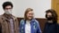 Three of the four Doxa magazine editors in a Moscow court on April 14.