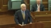 U.S. Senator John McCain addresses Kosovo's parliament in Pristina on April 13.