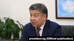 Алмамбет Шыкмаматов.