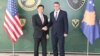 Deputy U.S. Assistant Secretary of State Hoyt Brian Yee (left) and the minister for Kosovo's security forces, Haki Demolli, in Pristina on March 29