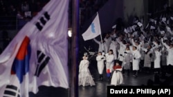 Төньяк һәм Көньяк Корея спортчылары бергә чыкты