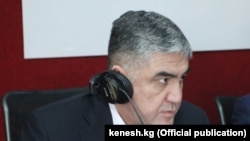 Курсан Асанов.