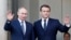 Президент России Владимир Путин (слева) и президент Франции Эмманюэль Макрон