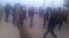 Кадр любительского видео о столкновении в Сарыагашском районе Южно-Казахстанской области, размещенного на сайте Youtube 6 февраля 2015 года.  