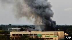 Захваченное группировкой "Аль-Шабаб" здание торгового центра Westgate в Найроби. 23 сентября 2013 года.