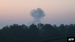 A cloud of smoke after a night drone strike in the western Ukrainian city of Lviv on June 20.
