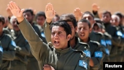 Ракка шаарын бошотуу үчүн АКШ машыктырган күчтөр. 17-июнь, 2017-жыл.