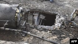 Ливан тараптан атылып келген ракета түшкөн үйдүн чатыры кыйрады. Израил. Нахариа шаары.