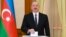 Azerbaijani leader Ilham Aliyev casts his vote in Nagorno-Karabakh in a snap presidential election on February 7. 