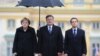 На запрошення президента Польщі Броніслава Коморовського до Варшави прибули президент Франції Ніколя Саркозі та канцлер Німеччини Анґела Меркель